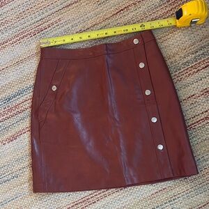 NWOT URBAN OUTFITTERS faux leather mini skirt in burnt orange